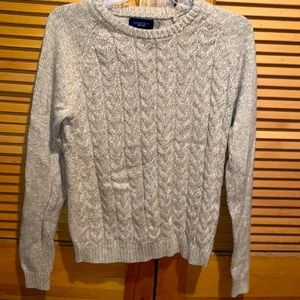 Womanโs Beige sweater